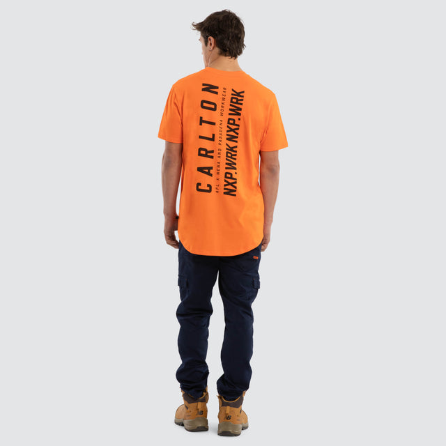 Model wears Carlton Blues Ethic Tee Work Orange T-Shirts in Orange - Image 5