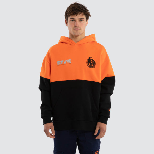 Model wears Collingwood Magpies Block Hoodie Orange Black Hoodies in Orange - Image 1