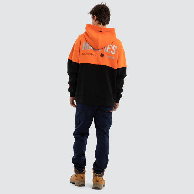 Model wears Collingwood Magpies Block Hoodie Orange Black Hoodies in Orange - Image 5