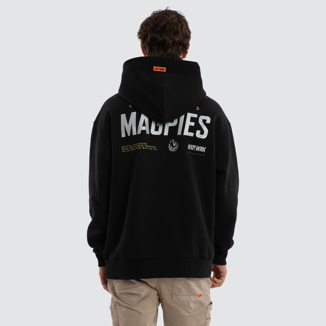 Model wears Collingwood Magpies Subject Hoodie Jet Black Hoodies in Black - Image 2