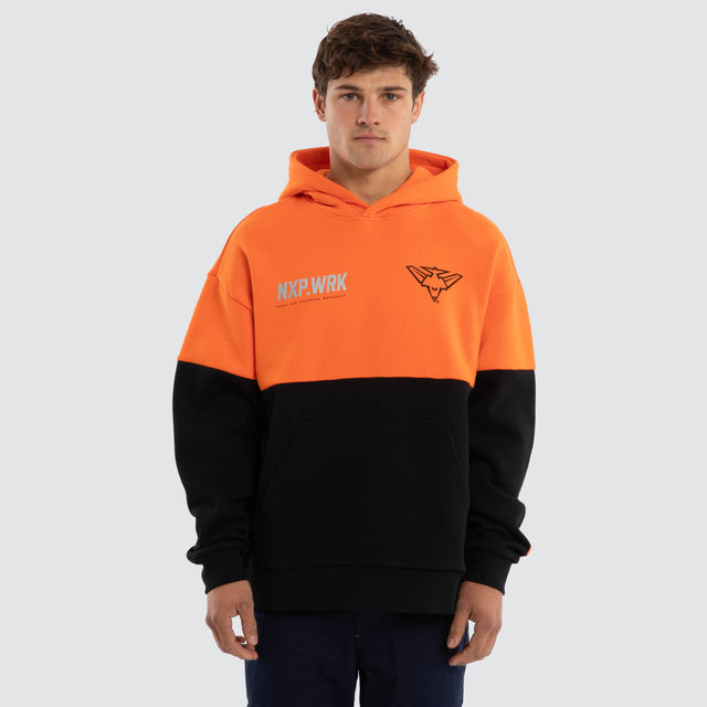 Model wears Essendon Bombers Block Hoodie Orange Black Hoodies in Orange - Image 1