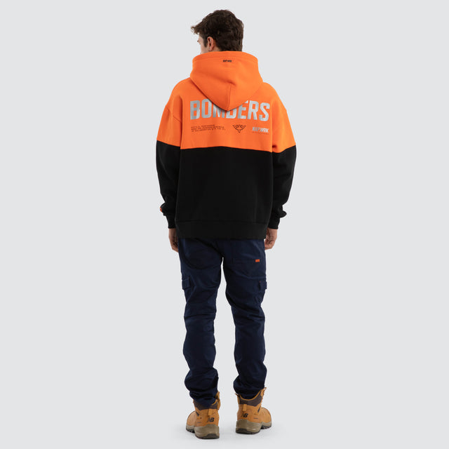 Model wears Essendon Bombers Block Hoodie Orange Black Hoodies in Orange - Image 5
