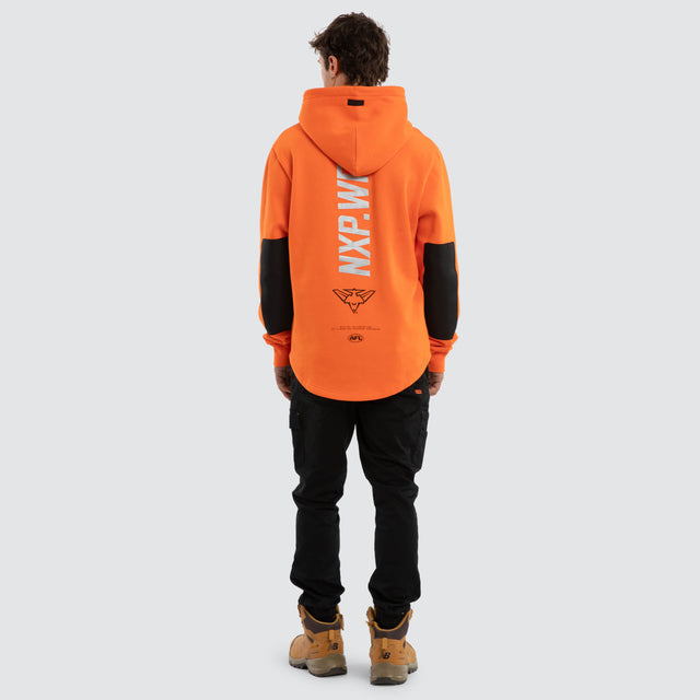 Model wears Carlton Blues Admission Hoodie Orange Hoodies in Orange - Image 5