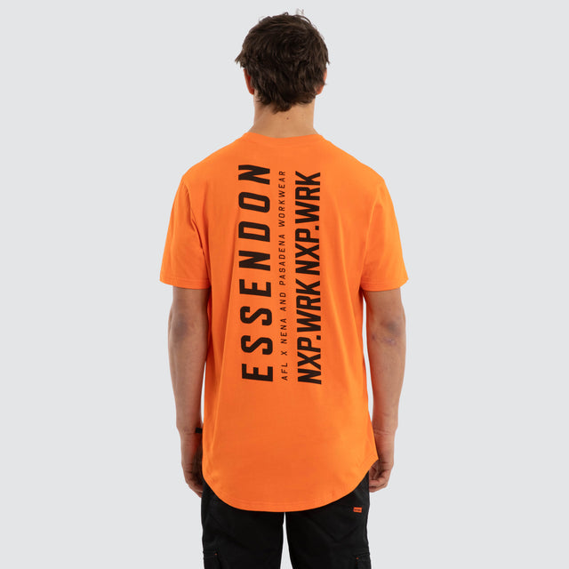Model wears Essendon Bombers Ethic Tee Work Orange T-Shirts in Orange - Image 2