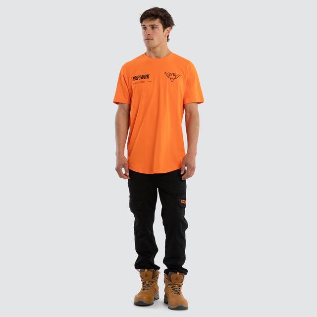 Model wears Essendon Bombers Ethic Tee Work Orange T-Shirts in Orange - Image 3