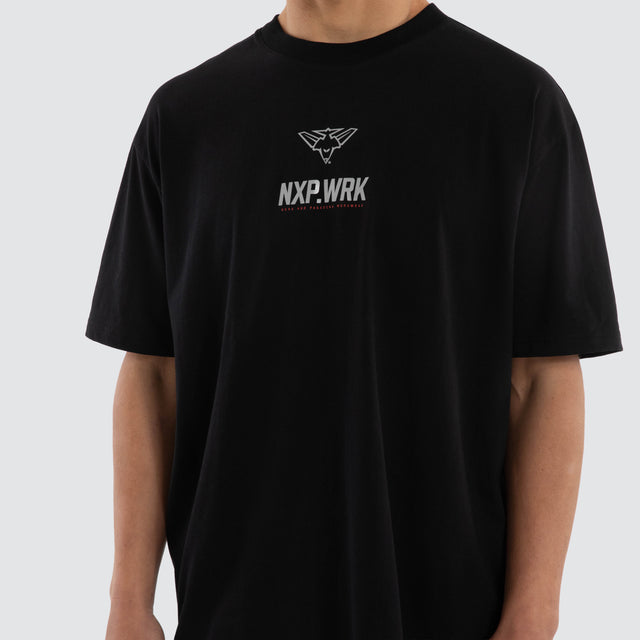Model wears Essendon Bombers Union Tee Jet Black T-Shirts in Black - Image 4