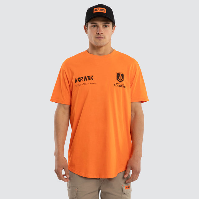 Model wears Fremantle Docker Ethic Tee Work Orange T-Shirts in Orange - Image 1