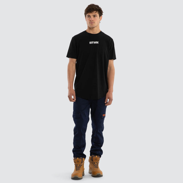 Model wears Fremantle Dockers Legal Tee Jet Black T-Shirts in Black - Image 3