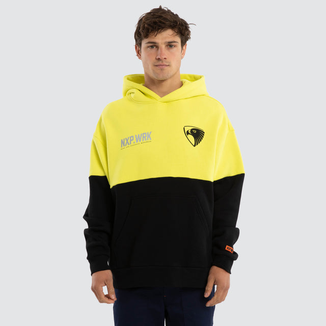 Model wears Hawthorn Hawks Block Hoodie Yellow Black Hoodies in Yellow - Image 1