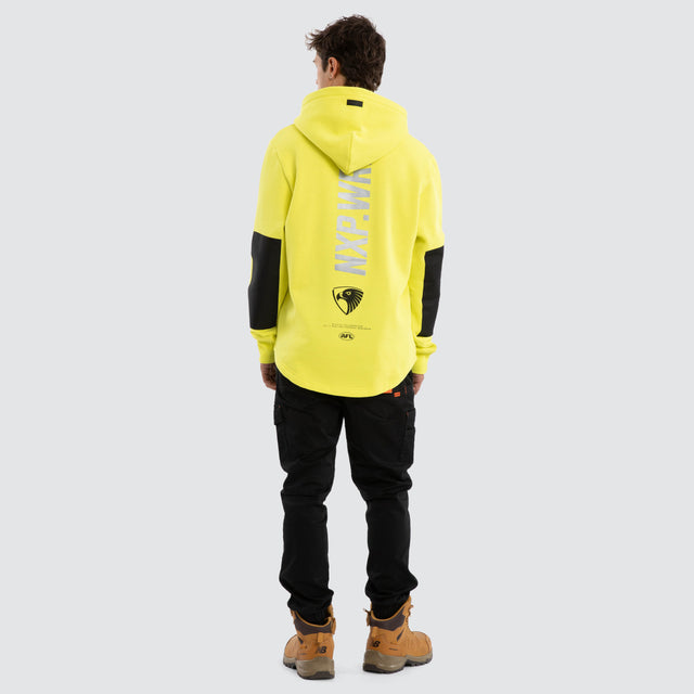 Model wears Hawthorn Hawks Admission Hoodie Yellow Hoodies in Yellow - Image 5