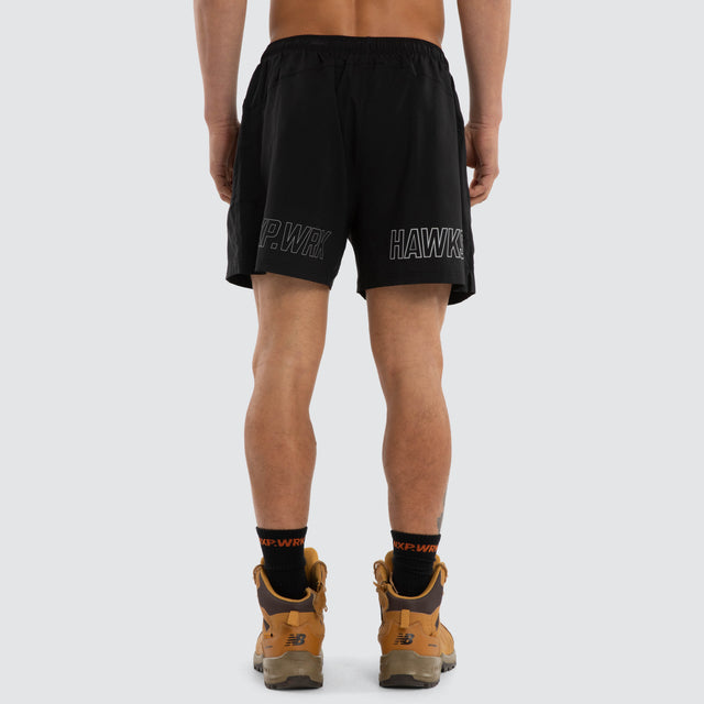 Model wears Hawthorn Hawks Contract Short Jet Black Shorts in Black - Image 2