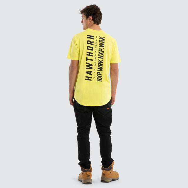 Model wears Hawthorn Hawks Ethic Tee Yellow T-Shirts in Yellow - Image 5