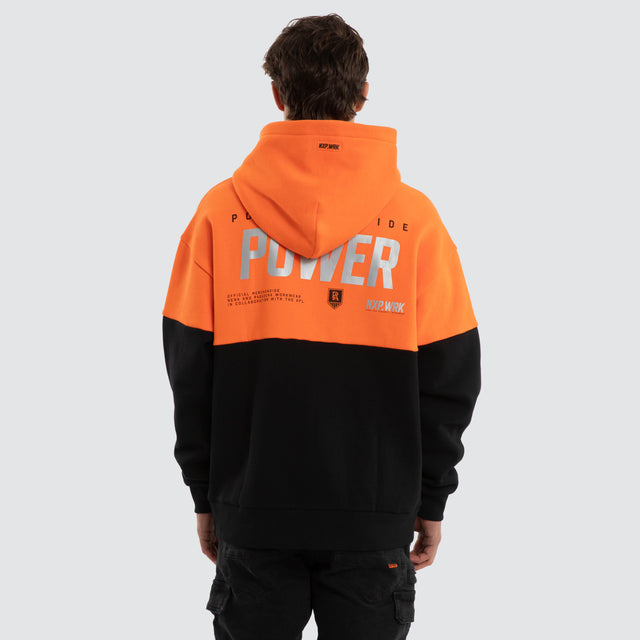 Model wears Port Adelaide Power Block Hoodie Orange Black Hoodies in Orange - Image 2