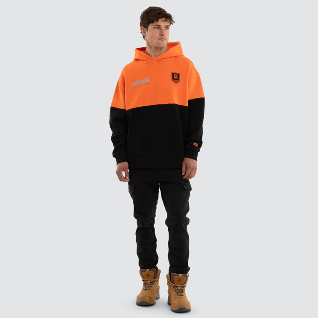 Model wears Port Adelaide Power Block Hoodie Orange Black Hoodies in Orange - Image 3