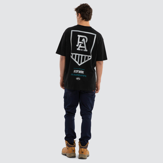 Model wears Port Adelaide Power Union Tee Jet Black T-Shirts in Black - Image 5