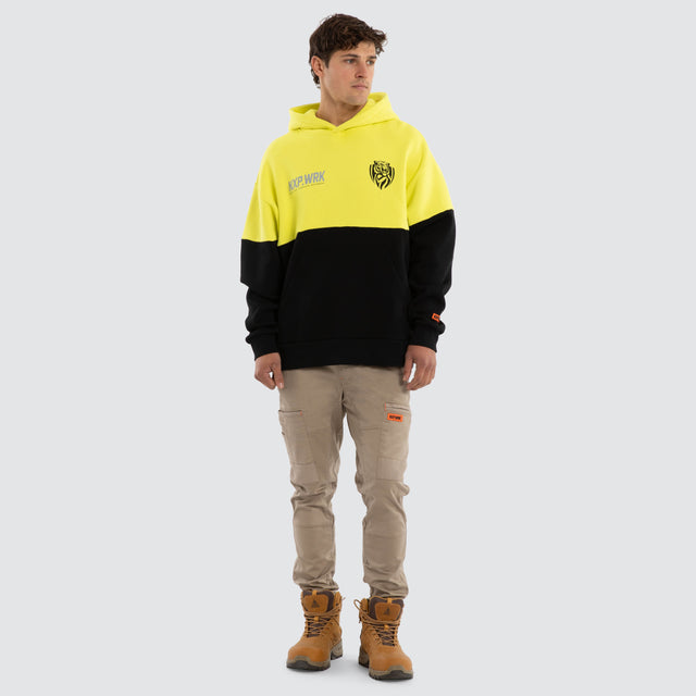 Model wears Richmond Tigers Block Hoodie Yellow Black Hoodies in Yellow - Image 3
