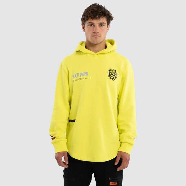 Model wears Richmond Tigers Admission Hoodie Yellow Hoodies in Yellow - Image 1