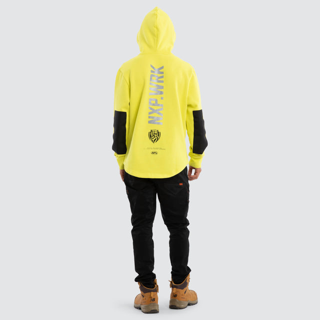 Model wears Richmond Tigers Admission Hoodie Yellow Hoodies in Yellow - Image 3