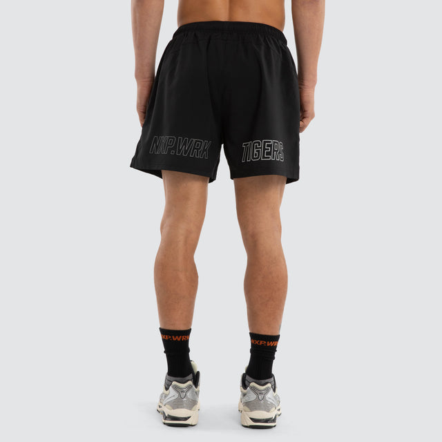 Model wears Richmond Tigers Contract Short Jet Black Shorts in Black - Image 2