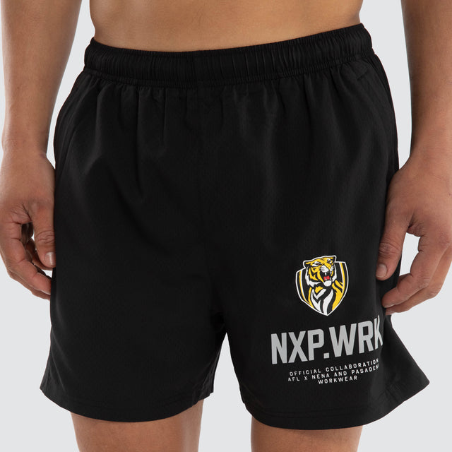 Model wears Richmond Tigers Contract Short Jet Black Shorts in Black - Image 3