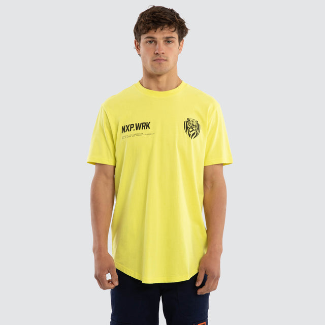 Model wears Richmond Tigers Ethic Tee Yellow T-Shirts in Yellow - Image 1