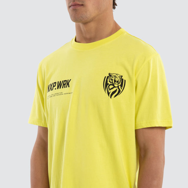 Model wears Richmond Tigers Ethic Tee Yellow T-Shirts in Yellow - Image 4