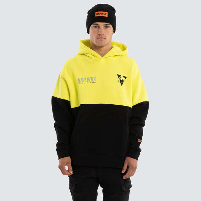 Model wears Sydney Swans Block Hoodie Yellow Black Hoodies in Yellow - Image 1