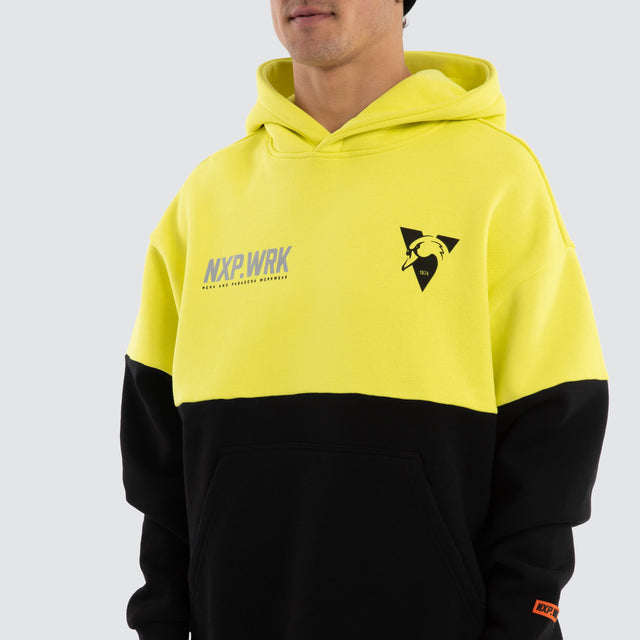 Model wears Sydney Swans Block Hoodie Yellow Black Hoodies in Yellow - Image 4