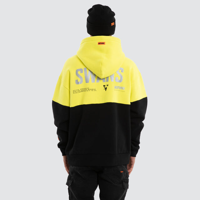 Model wears Sydney Swans Block Hoodie Yellow Black Hoodies in Yellow - Image 2