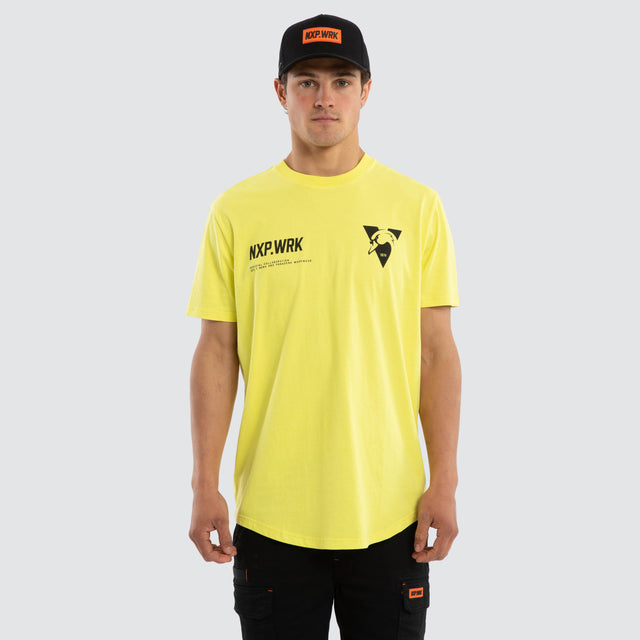 Model wears Sydney Swans Ethic Tee Yellow T-Shirts in Yellow - Image 1