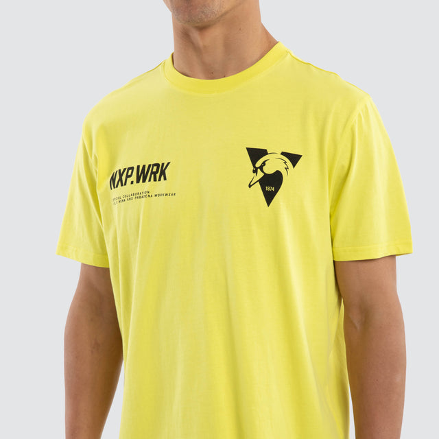 Model wears Sydney Swans Ethic Tee Yellow T-Shirts in Yellow - Image 4