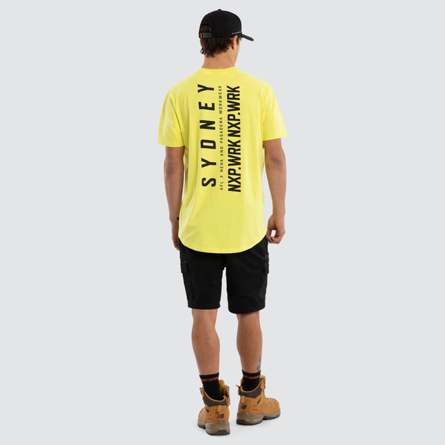 Model wears Sydney Swans Ethic Tee Yellow T-Shirts in Yellow - Image 5