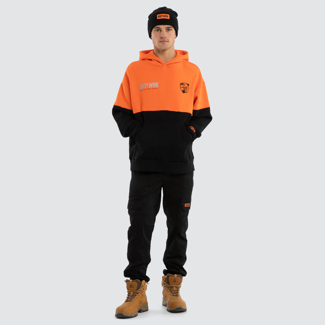 Model wears Western Bulldogs Block Hoodie Orange Black Hoodies in Orange - Image 3