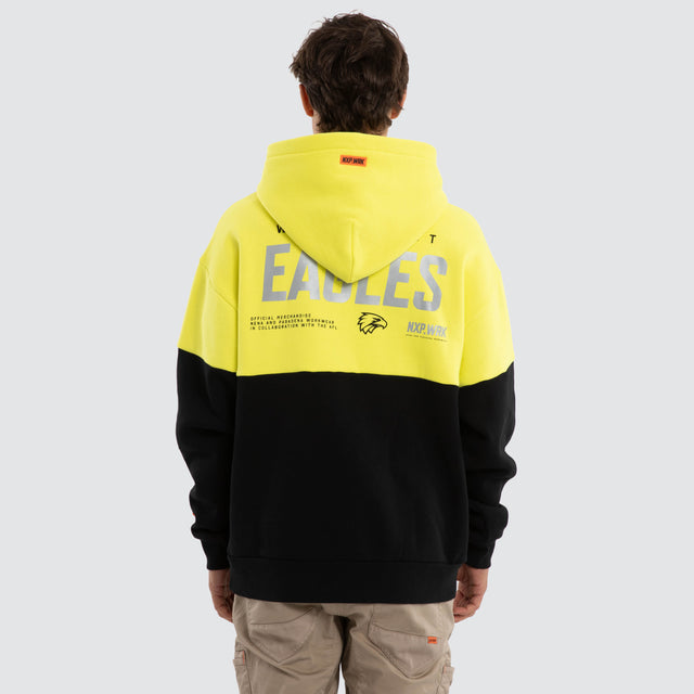 Model wears West Coast Eagles Block Hoodie Yellow Black Hoodies in Yellow - Image 2